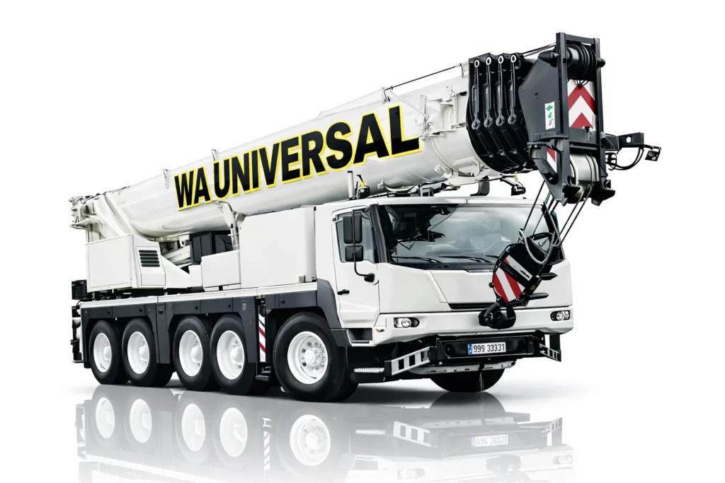 A large white mobile crane truck with "WA UNIVERSAL" written in bold yellow and black letters on the boom, positioned at an angle on a reflective white surface.