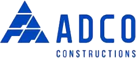 Logo for ADCO Constructions, featuring a stylized blue triangle made of smaller geometric shapes to the left of the bold blue text "ADCO" and smaller blue text "CONSTRUCTIONS" below.