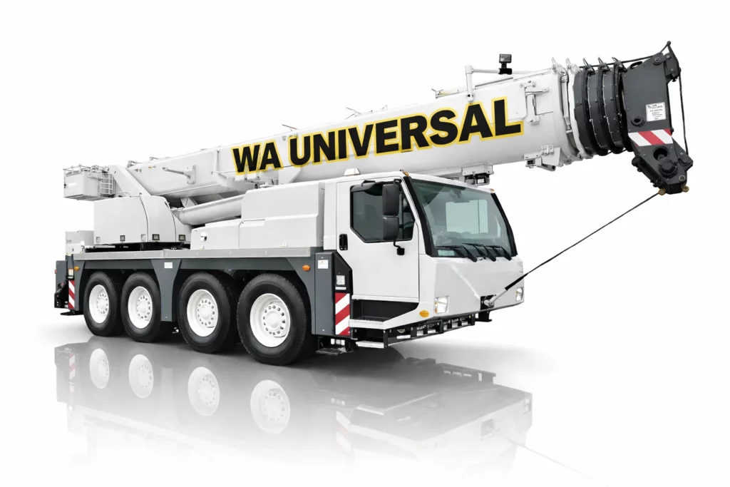 A large white mobile crane truck with six wheels and "WA UNIVERSAL" written in bold yellow and black letters on the crane arm, isolated on a white background with a subtle reflection below.